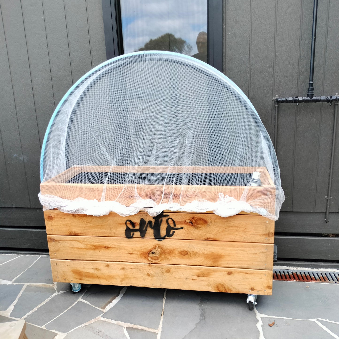 bird netting on self watering planter box